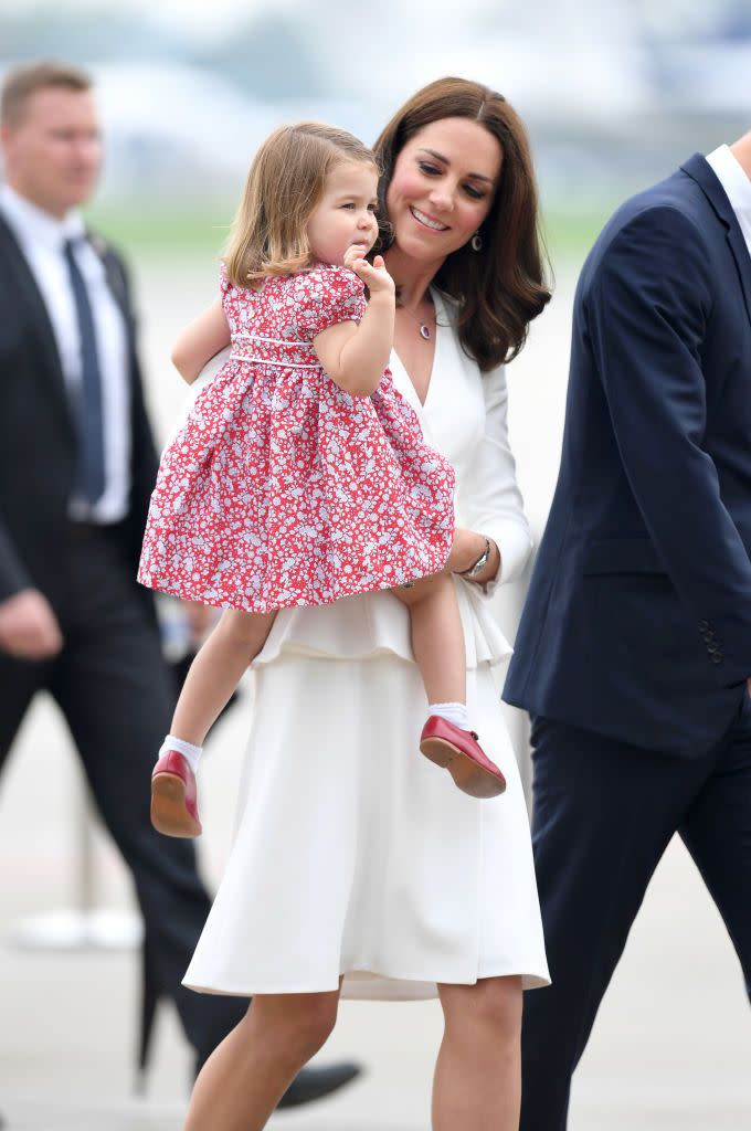 <p>While her brother Prince George pouted down the runway, Princess Charlotte was all smiles and waves upon arrival in Warsaw for the <a href="https://www.townandcountrymag.com/society/tradition/g10295873/kate-william-royal-family-tour-germany-poland-2017/" rel="nofollow noopener" target="_blank" data-ylk="slk:Royal Tour of Poland;elm:context_link;itc:0;sec:content-canvas" class="link ">Royal Tour of Poland</a>. </p>