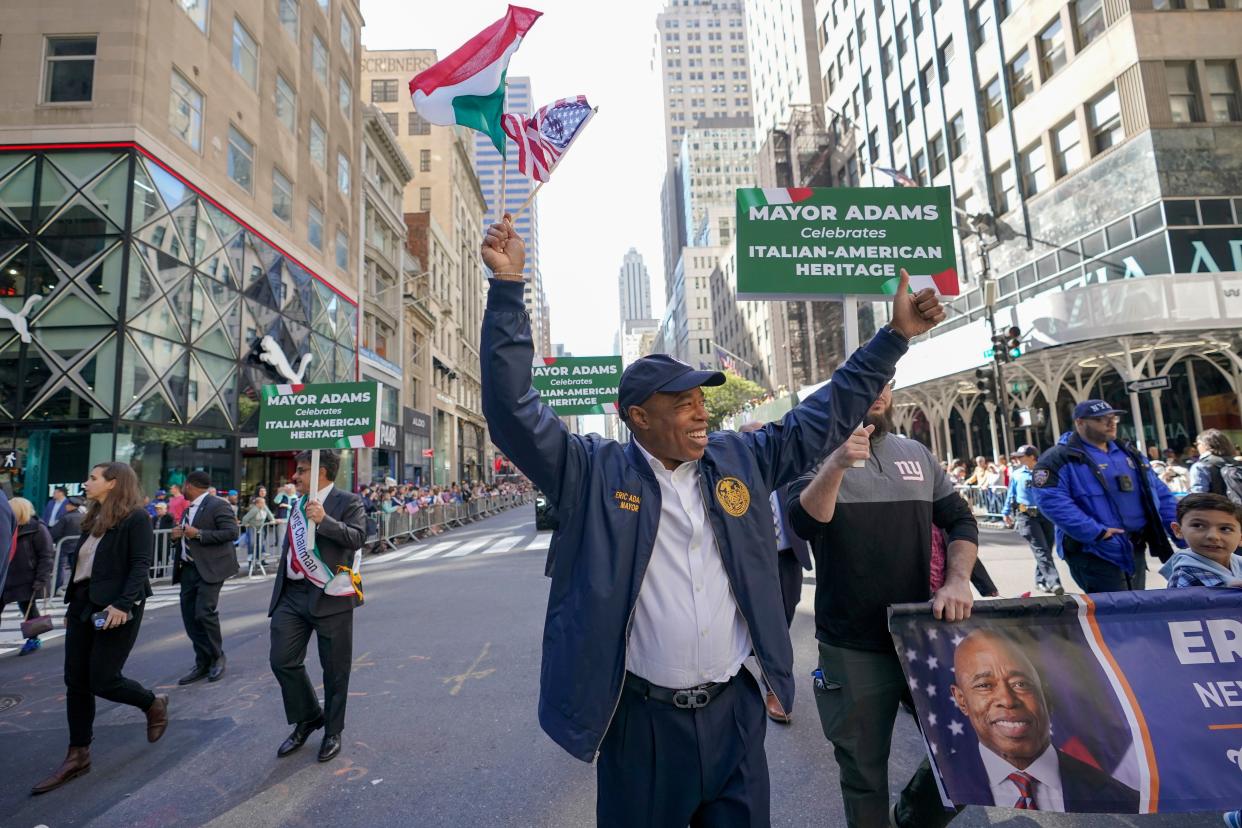 New York City Mayor Eric Adams, foreground, marches up 5th Avenue during annual Columbus Day Parade, Monday, Oct. 10, 2022, in New York. 