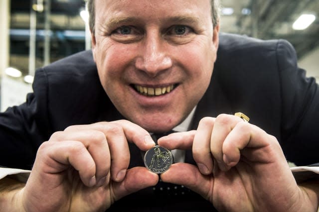 The great grandson of Sir Winston Churchill, Randolph, holds a Â£20 commemorative coin of the former Prime Minister inside the Royal Mint, Llantrisant, Wales, where the coin is being struck to commemorate 50 years on from the death of Churchill in 1965. PRESS ASSOCIATION Photo. Picture date: Thursday January 15, 2015. See PA story MONEY Churchill. Photo credit should read: Ben Birchall/PA Wire