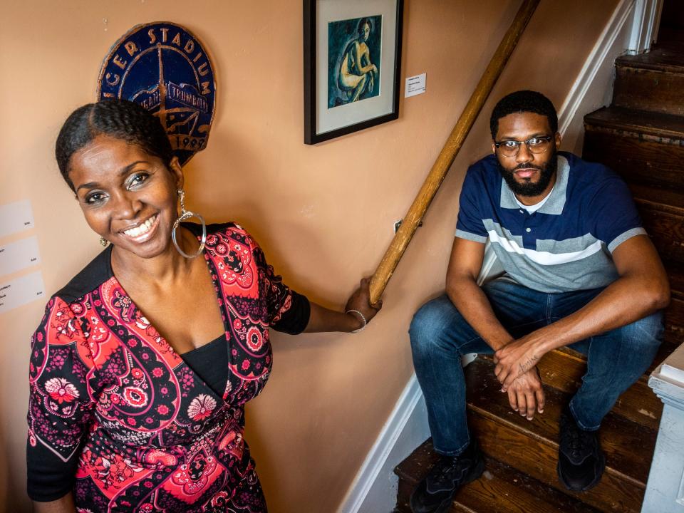 Misha McGlown, (left )the director of Irwin House Gallery, poses with Painter Jonathan Harris, who recently held a show at the gallery titled TRIPTYCH: Stronger Together that featured new work from Harris, Crystal Starks-Webb and Terrell Anglin.