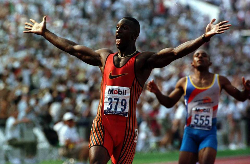 Michael Johnson reacts to setting a new World record in the men's 200 meters