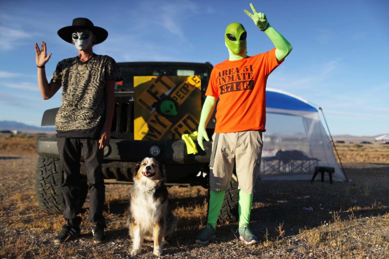 Revelers pose at the 'Storm Area 51' spinoff event 'Alienstock' in Rachel, Nevada: Getty Images