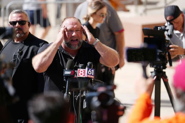 PHOTO: InfoWars founder Alex Jones speaks to the media outside Waterbury Superior Court during his trial on September 21, 2022 in Waterbury, Connecticut. (Joe Buglewicz/Getty Images)