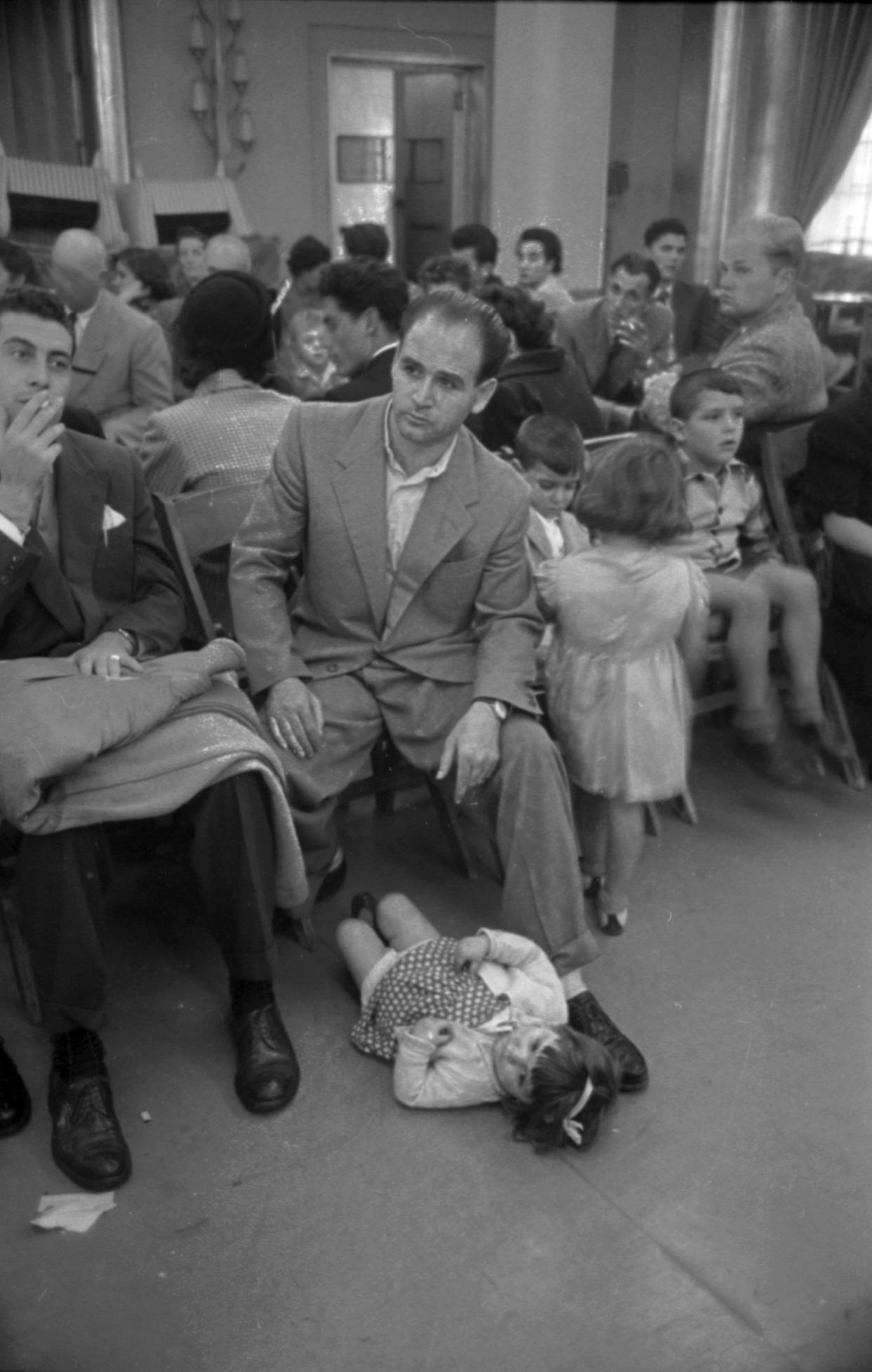 Raffaele Greco and his children on the Saturnia, waiting to go to the Ellis Island Immigration Station in New York, N.Y., in October of 1950.