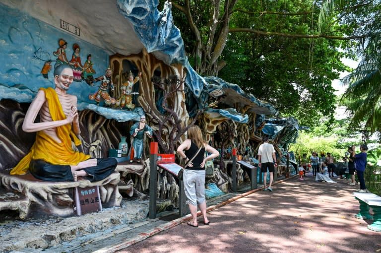 At Hell's Museum in Singapore, the main attraction at the Haw Par Villa park, visitors are welcomed to a kitschy, air-conditioned hell on Earth (Roslan RAHMAN)