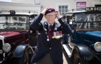 <p>World War II veteran Fred Glover adjusts his Parachute regimental beret as he arrives at Worthing Pier on July 4, 2017. Ninety London taxis with the Taxi Charity for Military Veterans brought around 200 veterans to Worthing for a day by the sea. </p><p><strong>RELATED: </strong><a href="https://www.redbookmag.com/life/g4603/sad-photos-guaranteed-to-make-you-cry/" rel="nofollow noopener" target="_blank" data-ylk="slk:30 Powerful Photos Guaranteed to Make You Cry;elm:context_link;itc:0;sec:content-canvas" class="link "><strong>30 Powerful Photos Guaranteed to Make You Cry</strong></a></p>