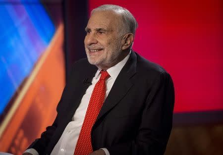 Billionaire activist-investor Carl Icahn gives an interview on FOX Business Network's Neil Cavuto show in New York February 11, 2014. REUTERS/Brendan McDermid