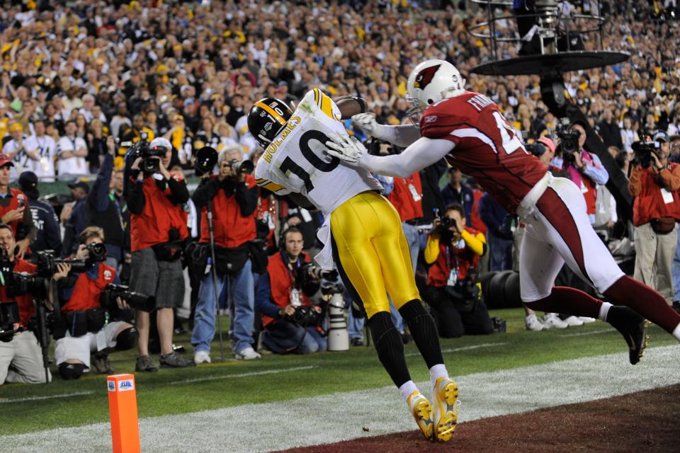 Steelers receiver Santonio Holmes catches a touchdown pass as Cardinals safety Aaron Francisco defends during the fourth quarter of Super Bowl 43, Feb. 1, 2009, in Tampa.