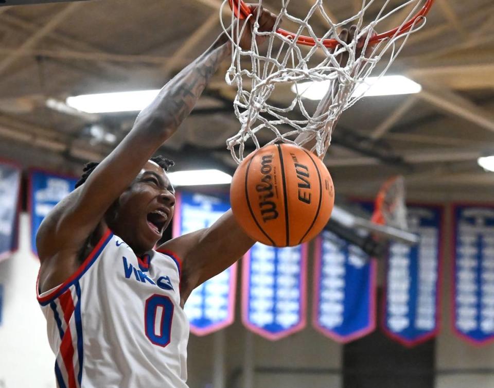 North Meck’s Isaiah Evans throws down a two-handed dunk during first half action against Mallard Creek on Friday, February 2, 2024 at North Meck High. North Meck defeated Mallard Creek 108-64.