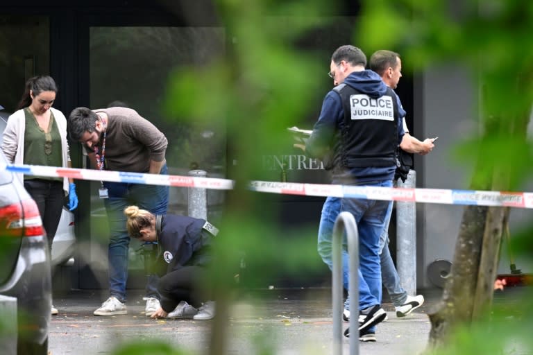 Police officers are at work on the site of a shooting that took place overnight during a wedding party in Thionville, northeastern France (Jean-Christophe VERHAEGEN)