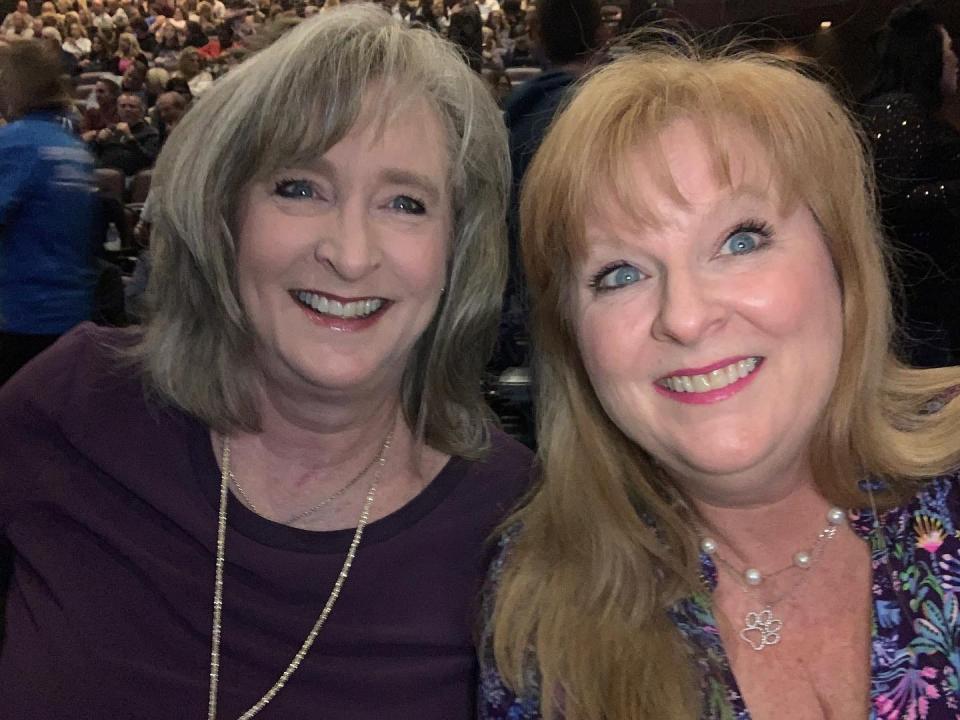 Sisters Pat Anderson and Suzy Fleming Leonard wait for Journey to take the stage at the Choctaw Casinos and Resort in Durant, Oklahoma.