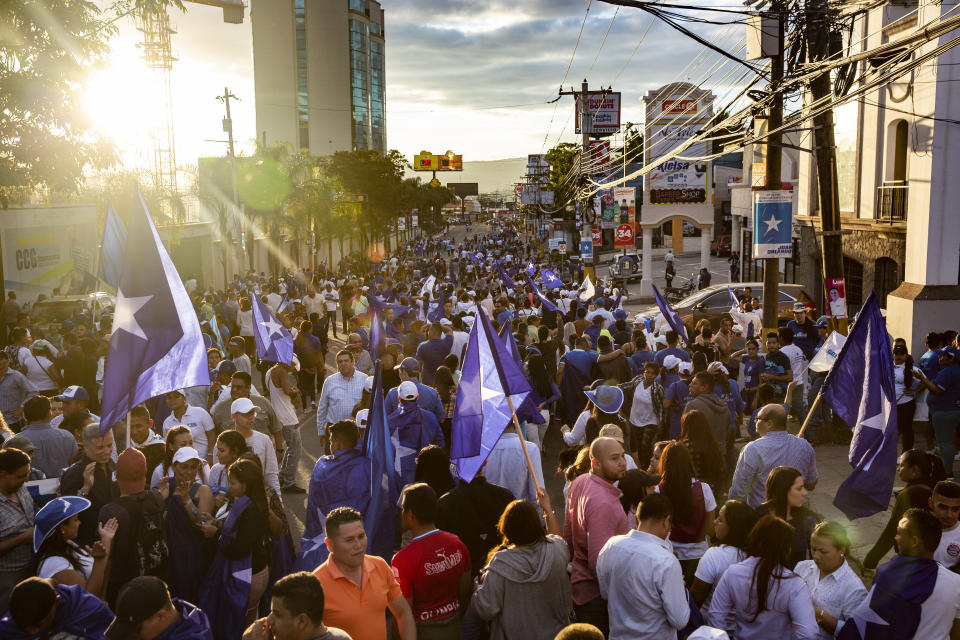 <p>A rally in support of Juan Orlando Hernández current president of Honduras, a conservative U.S. ally. The resuslts of the November 2017 elections were highly controversial. Hernández’s ran for a second term last year, after changing the constitution that prevented any president to be elected twice. Human rights organizations documented the murder of 14 people, 51 wounded and 844 detentions, of which 501 have occurred since the suspension of Constitutional guarantees on December 1, 2017, during post-electoral Honduran political crisis. (Photo: Francesca Volpi) </p>