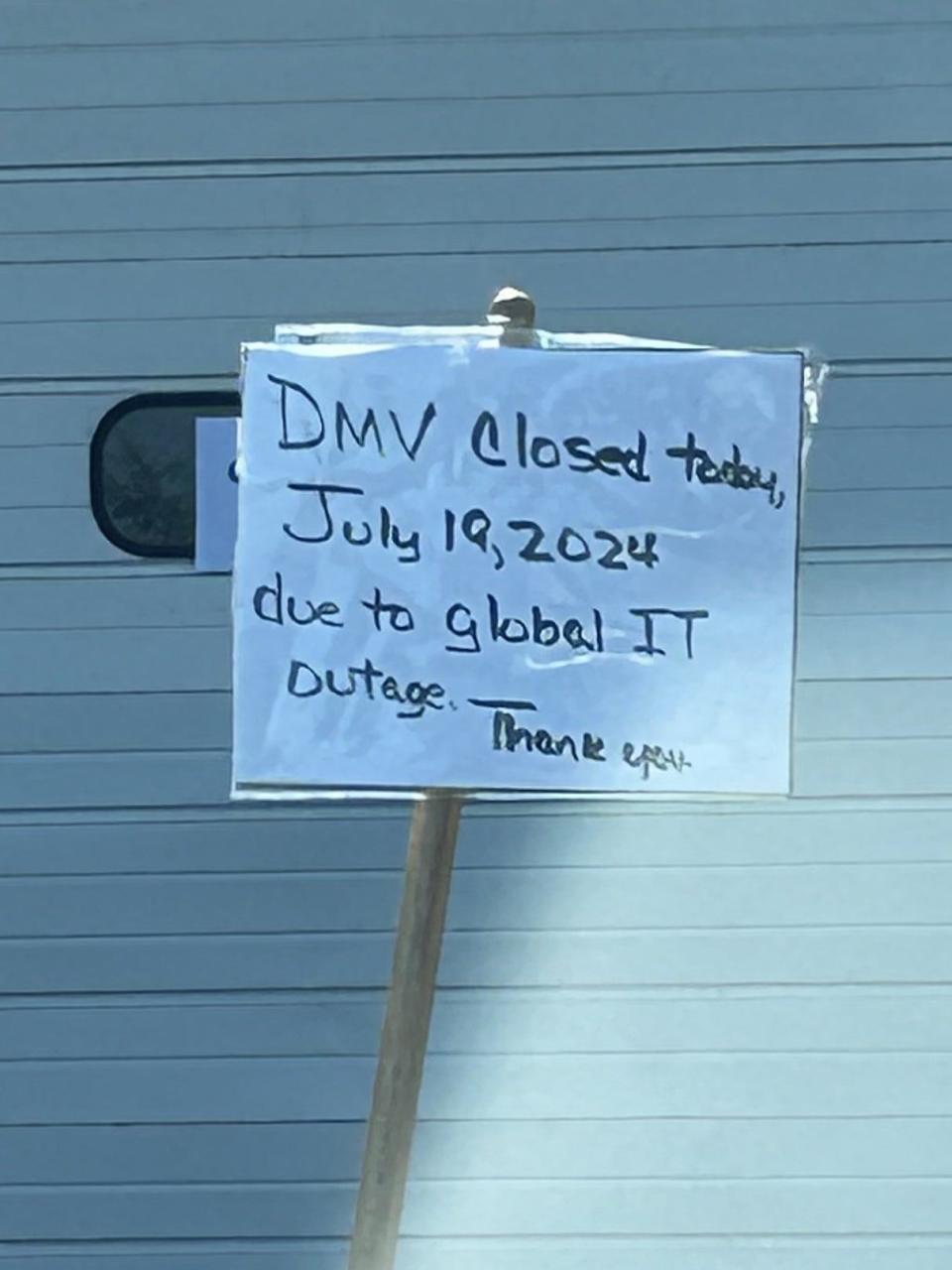 Delaware’s DMV locations are closed on July 19,2024, due to technical issues stemming from a global IT outage. Pictured above is a handwritten closure notice posted outside of the Delaware DMV in New Castle.