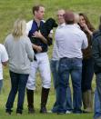 <p>Whether you're royal or not, one fact remains: Everyone loves their dog. Prince William showed that he has a soft spot for his family pup, Lupo, after picking her up for a cuddle post-polo match in 2012.</p>