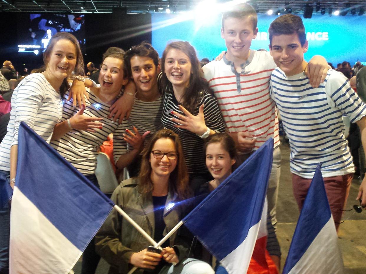 Young supporters at Marine Le Pen's final rally before the second round of voting in the French presidential election: The Independent