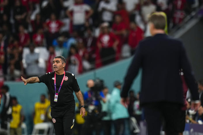 Tunisia's head coach Jalel Kadri gives instructions from the side line during the World Cup group D soccer match between Denmark and Tunisia, at the Education City Stadium in Al Rayyan, Qatar, Tuesday, Nov. 22, 2022. (AP Photo/Manu Fernandez)
