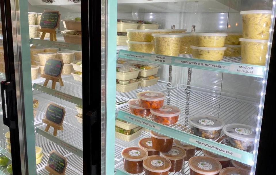 The stocked takeout case at Lettuce Cook.