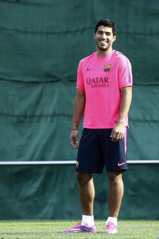 Barcelona's Uruguayan forward Luis Suarez takes part in a training session at the Sports Center FC Barcelona Joan Gamper in Sant Joan Despi, near Barcelona, on August 15, 2014