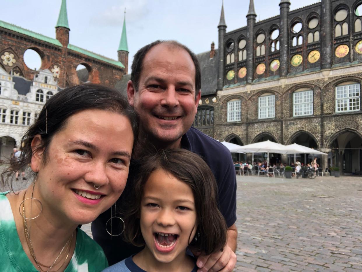 Author Sabrina Cooper with her partner and child in Lubeck