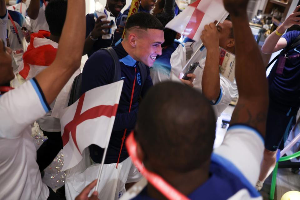 The England players are welcomed back to their hotel after beating Senegal (@England)