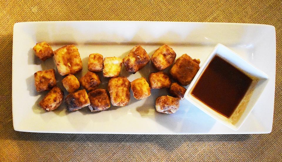 Queso frito, a fried cheese appetizer, at Puerto and Ecua Restaurant in Fall River.