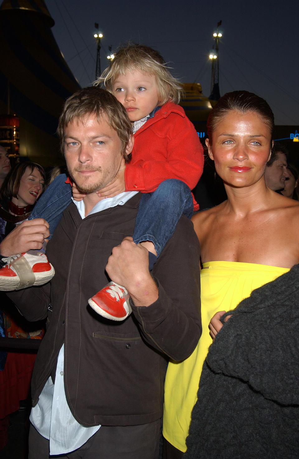 Norman Reedus and Helena Christensen take Mingus to a Cirque du Soleil event in 2003. (Photo: Getty Images)