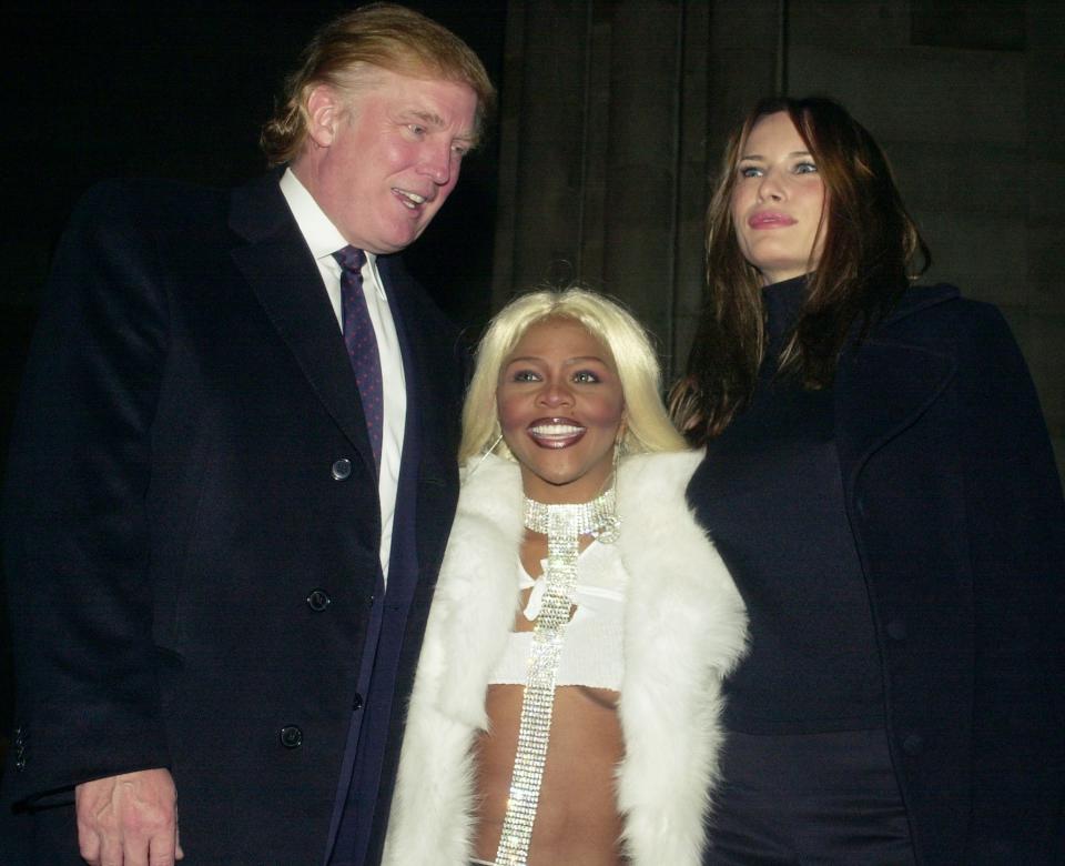 With Lil' Kim.