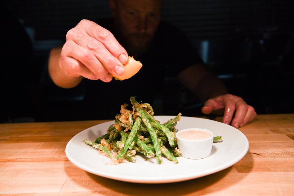 Tempura fried green beans are plated at Elkmont Station in Farragut on April 13.