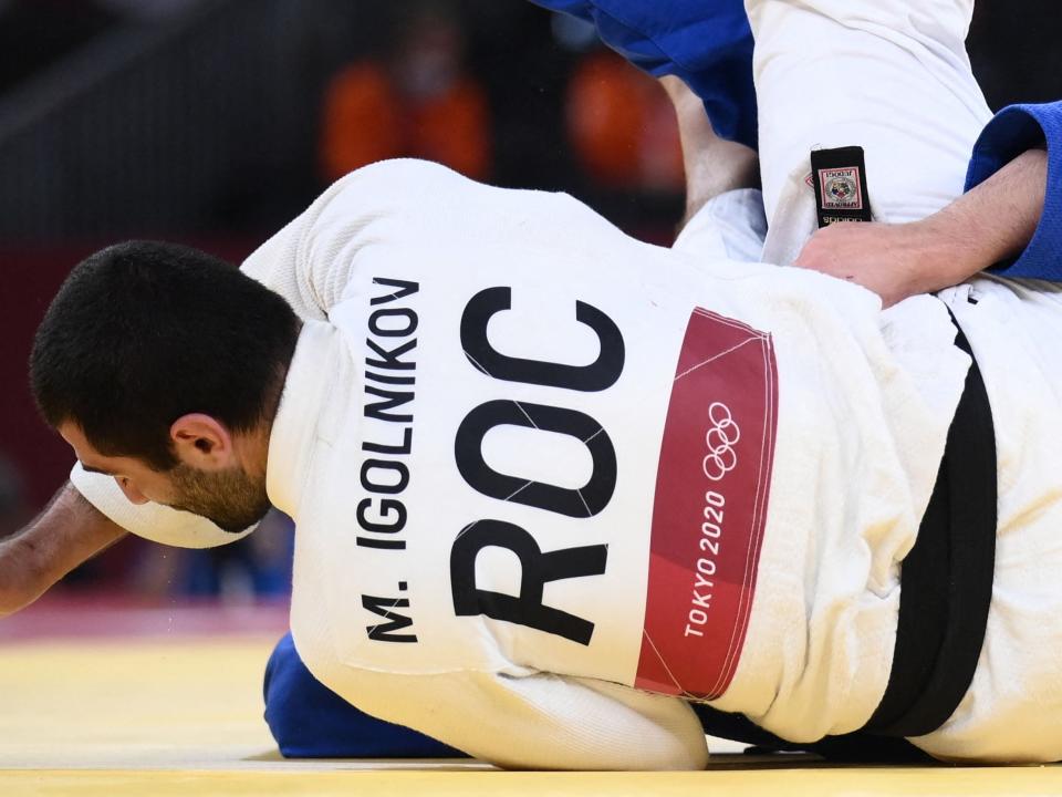 The ROC’s Mikhail Igolnikov competes in the judo men’s -90kg semifinal (AFP)