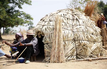 Fulani herdsman Musa Adamu (R) speaks to a reporter in Zango, Zango-kataf local govt, Kaduna State March 22, 2014. REUTERS/Afolabi Sotunde