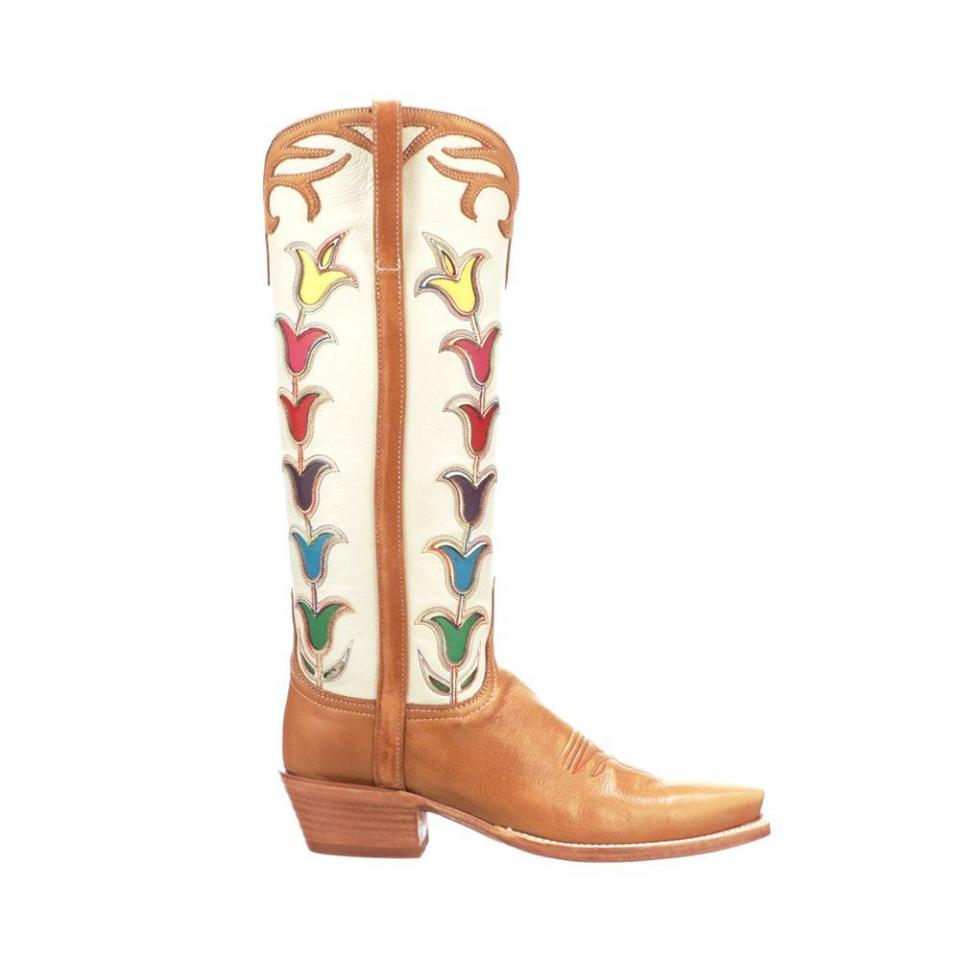 <p><a href="https://go.redirectingat.com?id=74968X1596630&url=https%3A%2F%2Flucchese.com%2Fcollections%2Fwomen-cowboy-boots%2Fproducts%2Fladies-tall-tulip-rust-glitz-cream&sref=https%3A%2F%2F" rel="nofollow noopener" target="_blank" data-ylk="slk:Shop Now;elm:context_link;itc:0;sec:content-canvas" class="link ">Shop Now</a></p><p>Ladies Tall Tulip</p><p>lucchese.com</p><p>$1295.00</p>