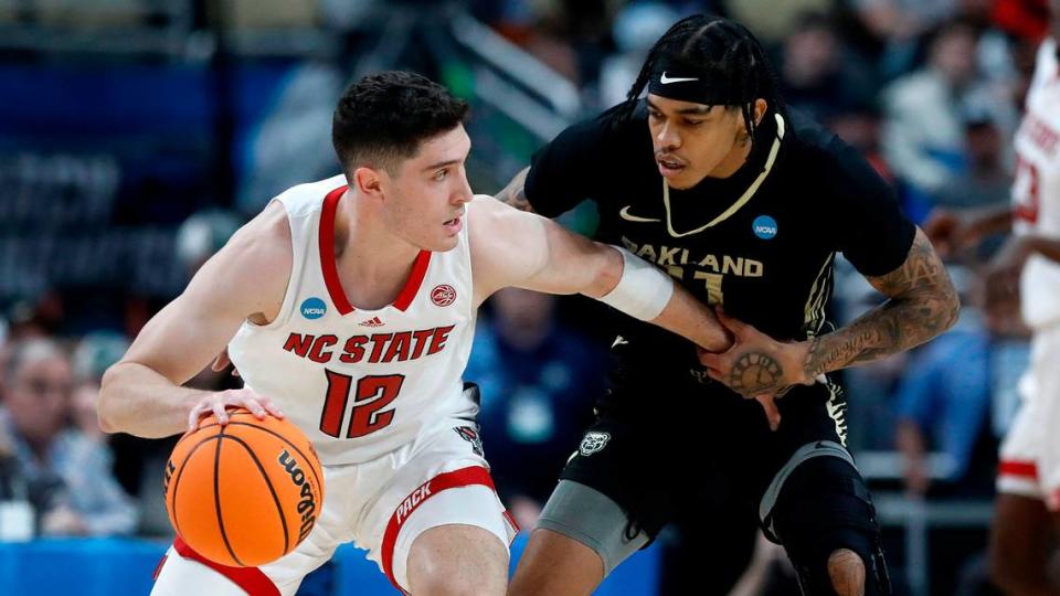 N.C. State’s Michael O’Connell handles the ball under pressure during the first half of the Wolfpack’s NCAA Tournament second round game against Oakland on Saturday, March 23, 2024, at PPG Paints Arena in Pittsburgh, Pa.
