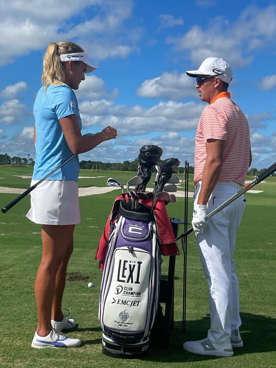 Lexi Thompson and Rickie Fowler chat on the driving range before participating in a Pro Exhibition Match Friday at Panther National featuring six stars on the PGA and LPGA Tours