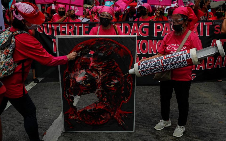 Protesters mark International Women's Day in Metro Manila -  MARK R CRISTINO/EPA-EFE/Shutterstock