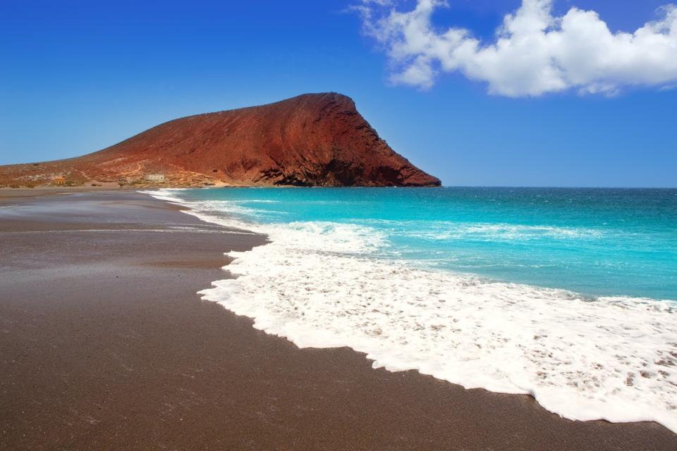 Playa de la Tejita is separated from El Medano by the Montana Roja (Getty Images)