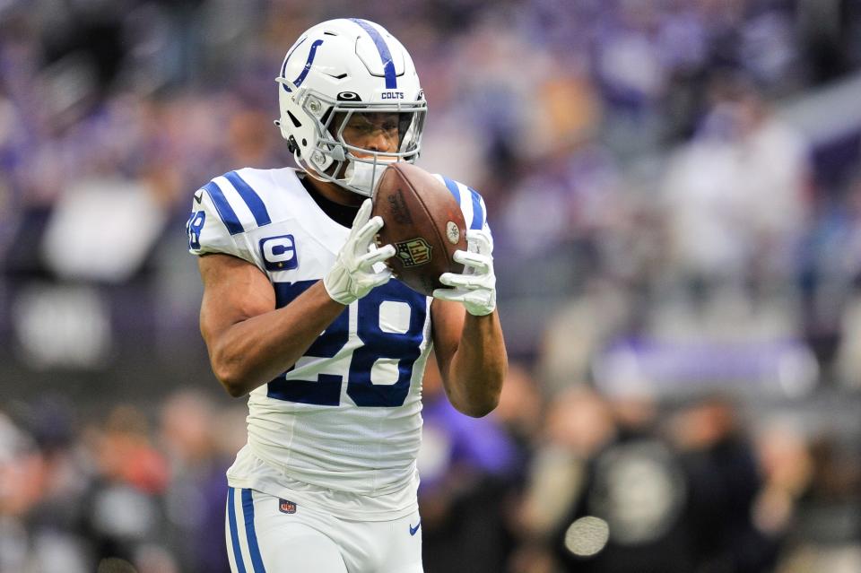 Dec 17, 2022; Minneapolis, Minnesota, USA; Indianapolis Colts running back Jonathan Taylor (28) warms up before the game against the Minnesota Vikings at U.S. Bank Stadium. Mandatory Credit: Jeffrey Becker-USA TODAY Sports