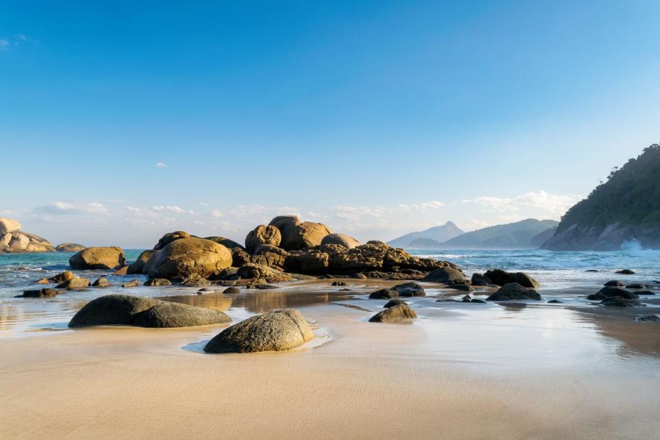 Lively corals teeming with marine life lap the powder sands on Lopes Mendes (Getty Images/iStockphoto)