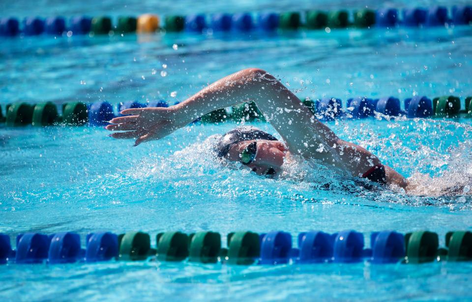 Lily Drons of Estero leads the 100 Yard Freestyle at the LCAC Championships on Friday, Oct. 6, 2023, at the FGCU Aquatic Center.