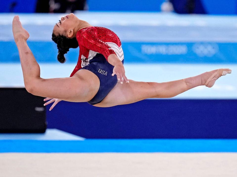 Sunisa Lee competes in the floor exercise.