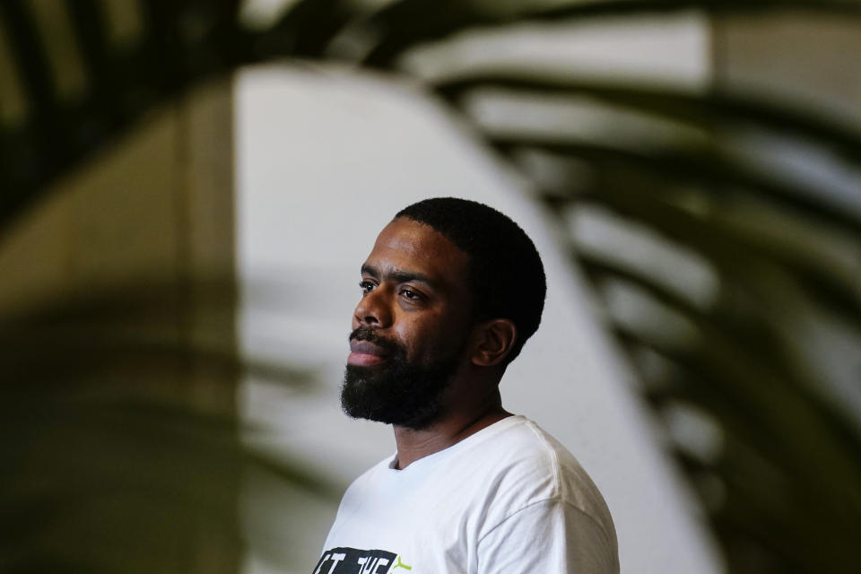 Curtis Duncan, poses for a portrait at one of the "Stop Cop City" movement headquarters, Thursday, July 20, 2023 in Atlanta. Activists with the Stop Cop City Vote Coalition are trying to get the signatures of more than 70,000 Atlanta residents by Aug. 14 to force a referendum allowing voters to decide the fate of a proposed police and firefighter training center. (AP Photo/Brynn Anderson)