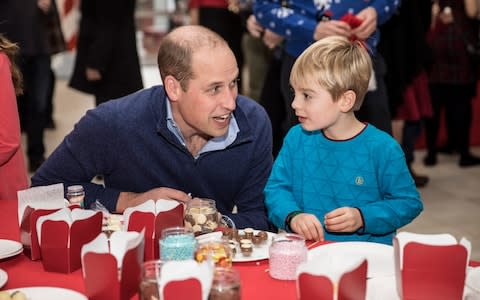 Duke of Cambridge sits with Harry, five - Credit: Richard Pohle