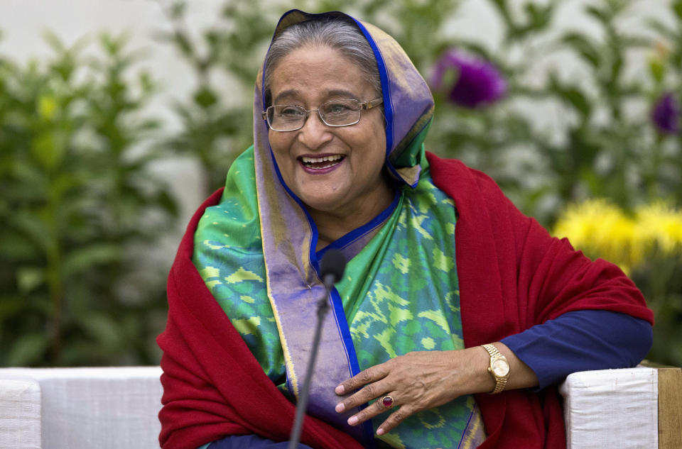 FILE - In this Monday, Dec. 31, 2018, file photo, Bangladeshi Prime Minister Sheikh Hasina interacts with journalists in Dhaka, Bangladesh. Prime Minister Hasina is wooing Japan for aid, trade and investment in a visit that highlights cordial relations with the administration of Prime Minister Shinzo Abe. (AP Photo/Anupam Nath, File)