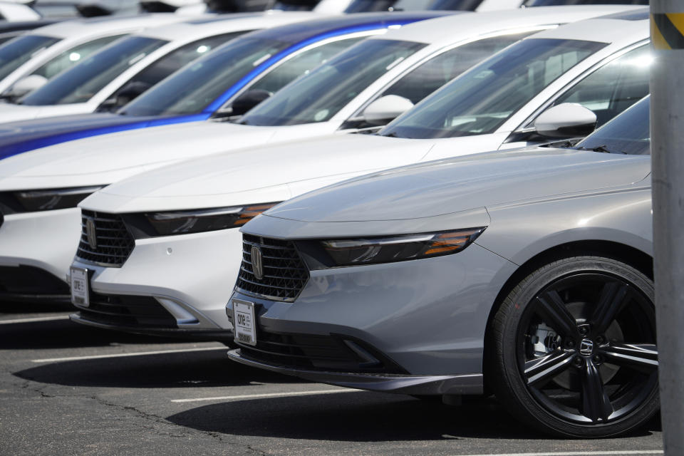 Unsold 2023 Accord sedans sit outside a Honda dealership Thursday, April 20, 2023, in Highlands Ranch, Colo. (AP Photo/David Zalubowski)