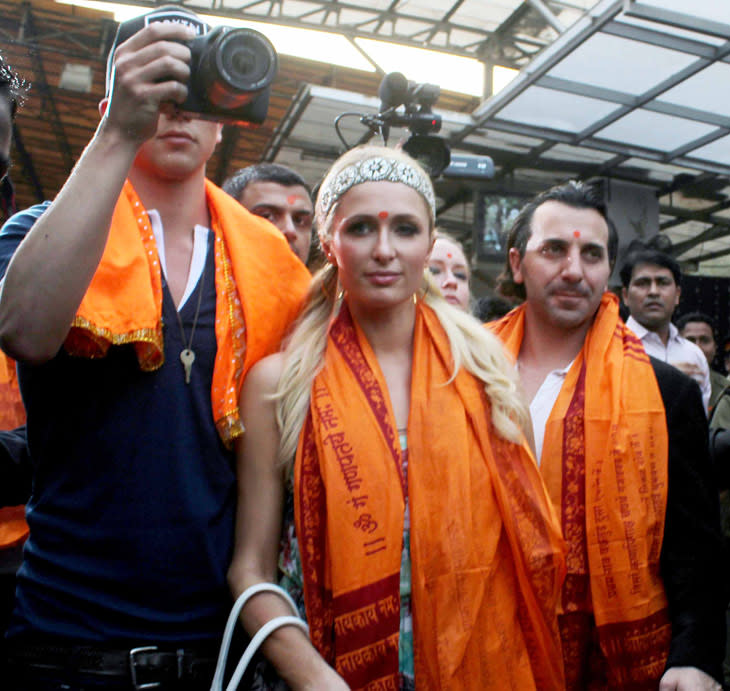 None in the 500-strong crowd that jostled for a glimpse knew the identity of the blonde who paid a visit to Siddhivinayak temple this afternoon.