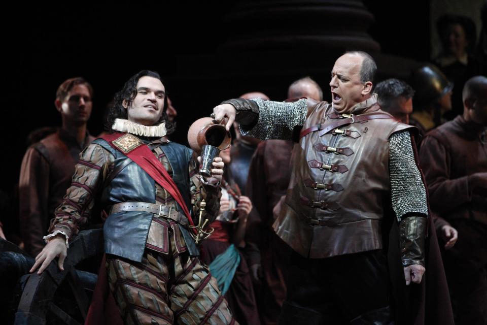 In this Friday, Oct. 5, 2012 photo, Michael Fabiano, left, performs as Cassio alongside Falk Struckman performing as Iago during the final dress rehearsal of Guiseppe Verdi's "Otello" at the Metropolitan Opera in New York. (AP Photo/Mary Altaffer)