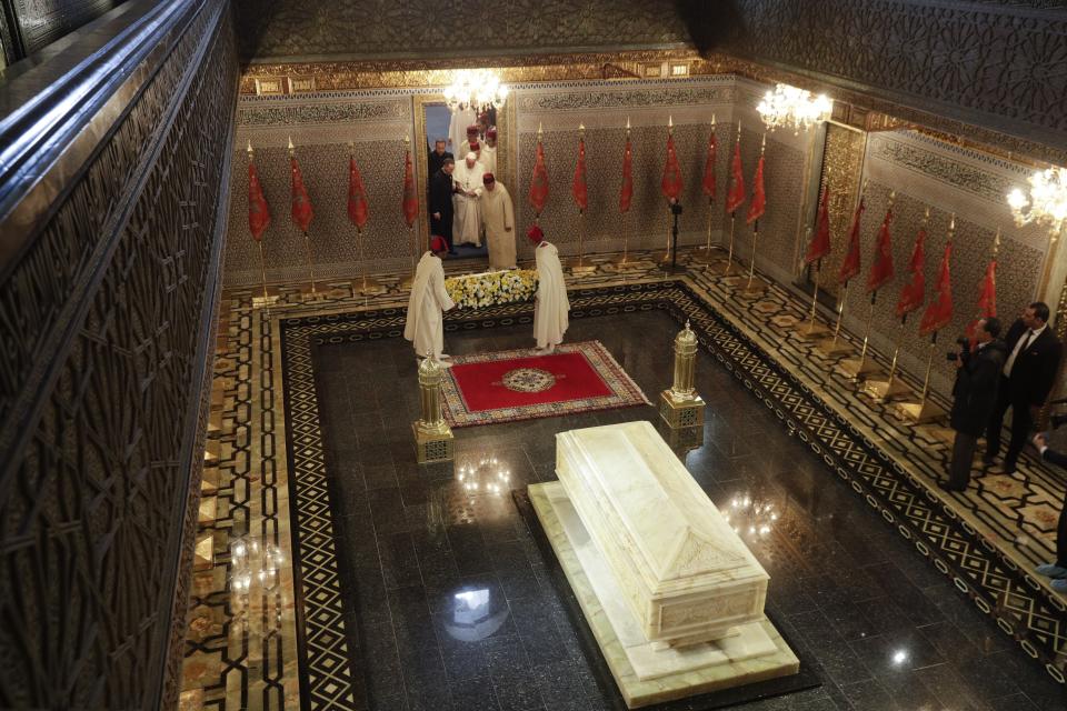 Pope Francis pays a visit to the Mausoleum of King Mohammed V, in Rabat, Morocco, Saturday, March 30, 2019. Francis's weekend trip to Morocco aims to highlight the North African nation's tradition of Christian-Muslim ties while also letting him show solidarity with migrants at Europe's door and tend to a tiny Catholic flock on the peripheries. (AP Photo/Gregorio Borgia)