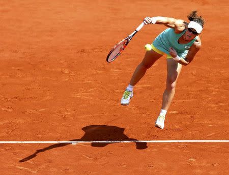 Samantha Stosur of Australia plays a shot to Amandine Hesse of France during their women's singles match at the French Open tennis tournament at the Roland Garros stadium in Paris, France, May 27, 2015. REUTERS/Vincent Kessler