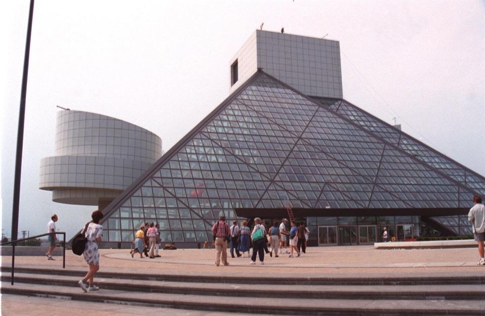 The Rock and Roll Hall of Fame's glass pyramid, a signature trait of architect I.M. Pei's buildings, rises on the lakefront in Cleveland.
