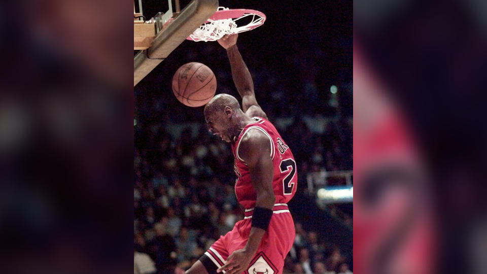 Mandatory Credit: Photo by Eric Draper/AP/Shutterstock (6510082b)JORDAN Chicago Bulls' Michael Jordan dunks for two points against the Los Angeles Lakers in the first quarter, in Inglewood, CalifBULLS LAKERS, INGLEWOOD, USA.