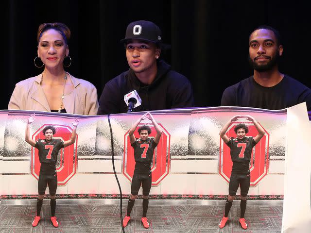 <p>David Chisholm/Image of Sport/AP</p> C.J. Stroud with parents after signing an early national letter of intent to attend Ohio State on December 19, 2019.